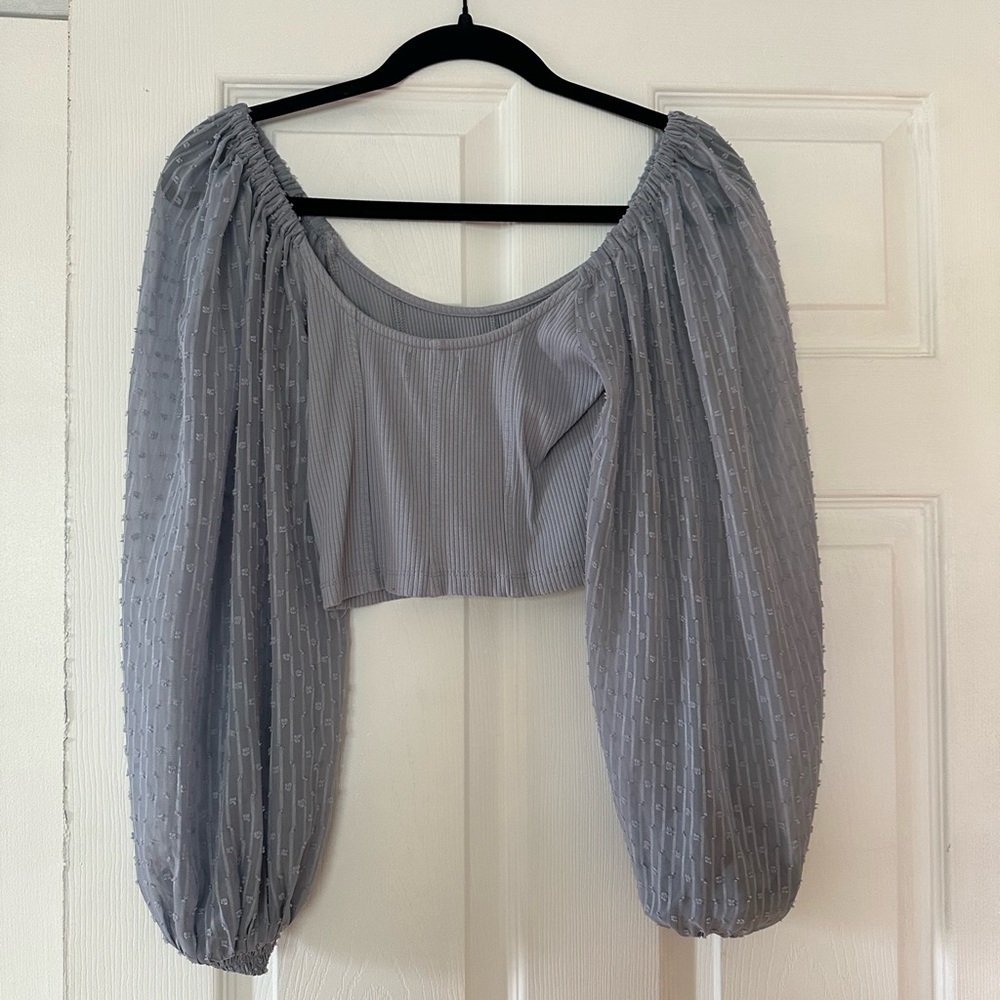 Worn once, lilac top with flowy sleeves.
